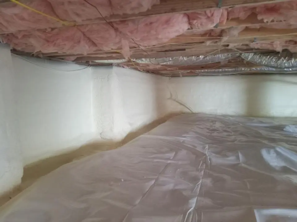Crawl space encapsulation with closed-cell spray foam for Roof Maintenance in Westbury